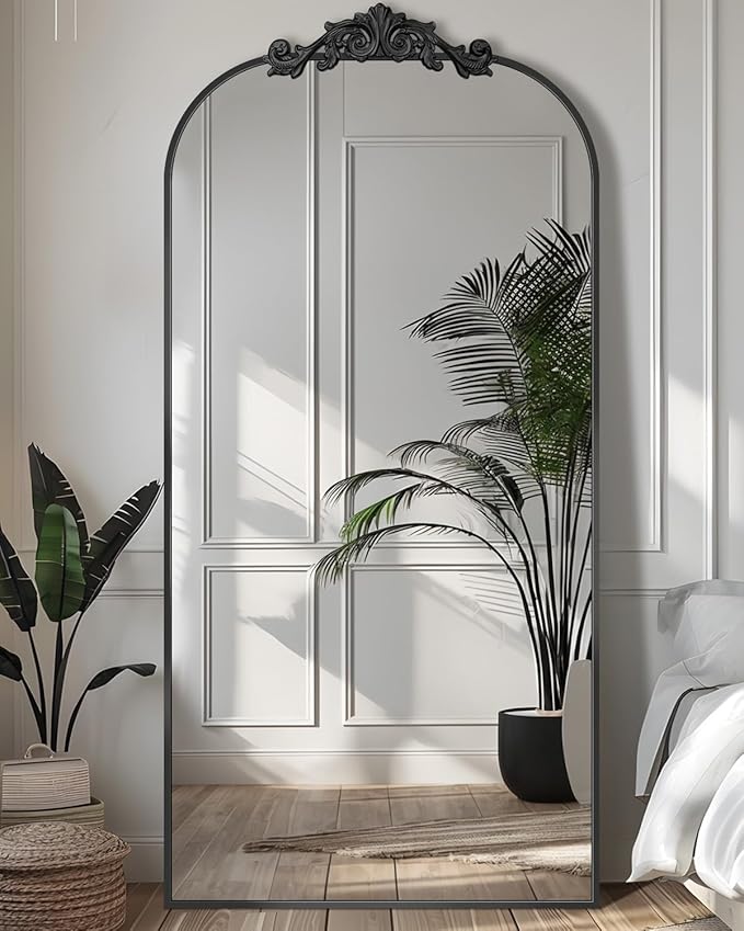 Arched freestanding full-length mirror with elegant frame, placed in a modern room setting-3