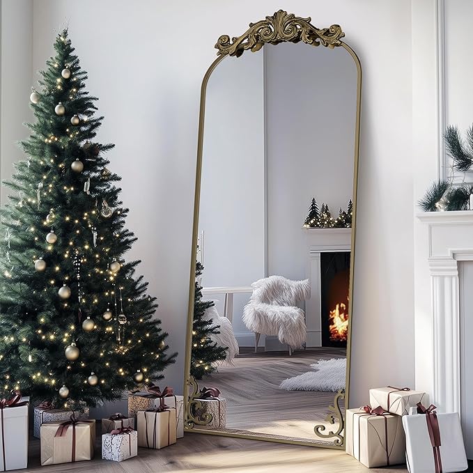 Arched freestanding full-length mirror with elegant frame, placed in a modern room setting-4
