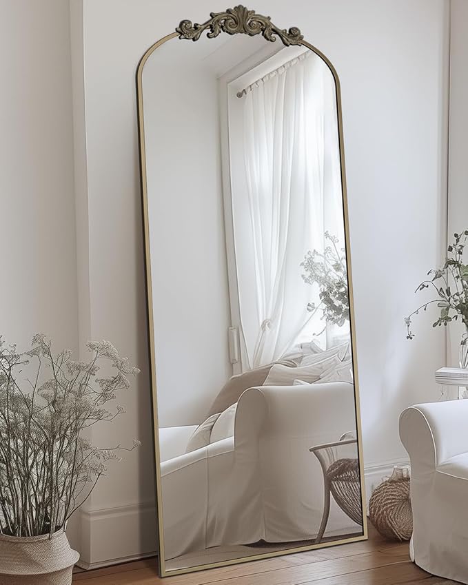 Arched freestanding full-length mirror with elegant frame, placed in a modern room setting-5