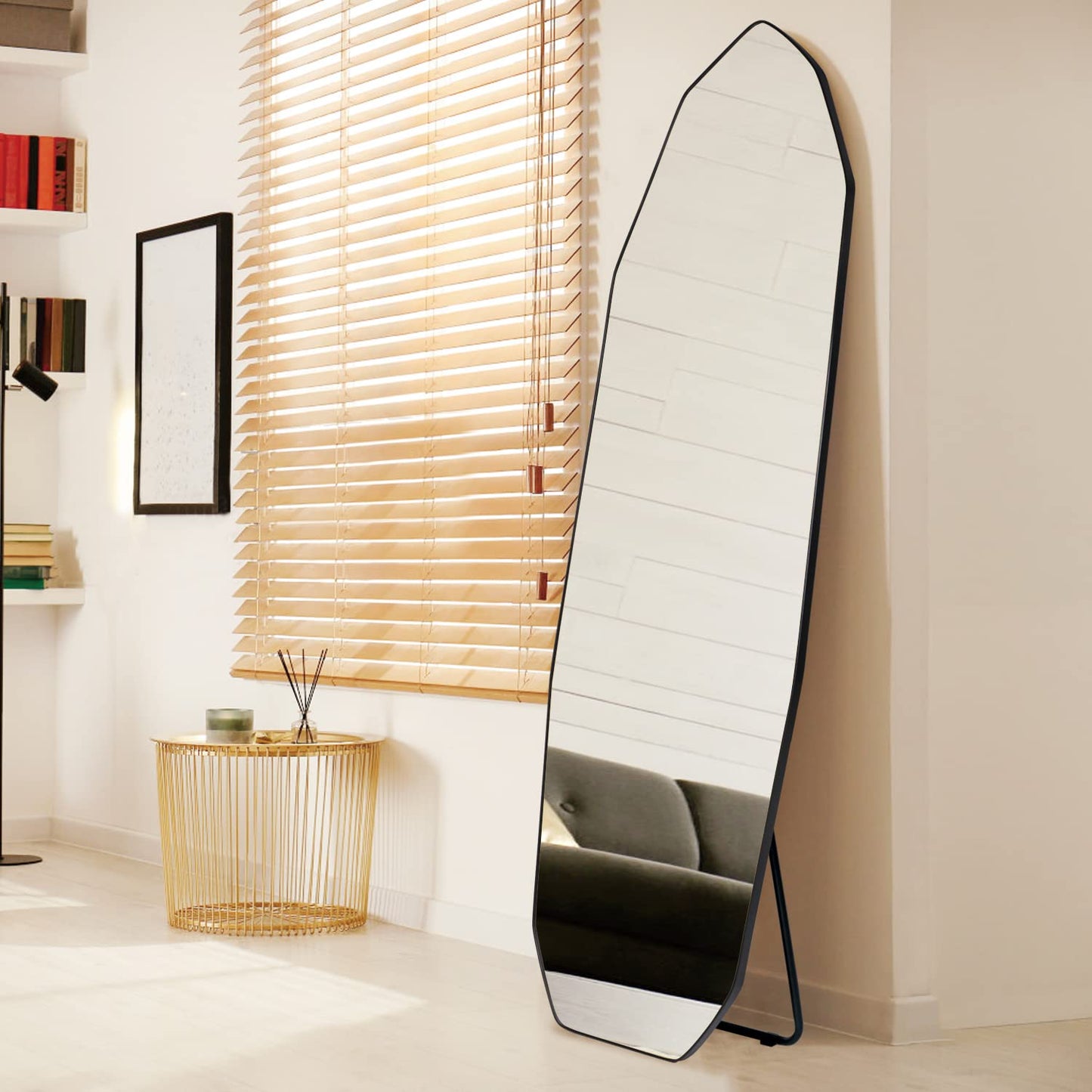 Irregular full-length mirror with sculptural frame, styled in a modern living space-1