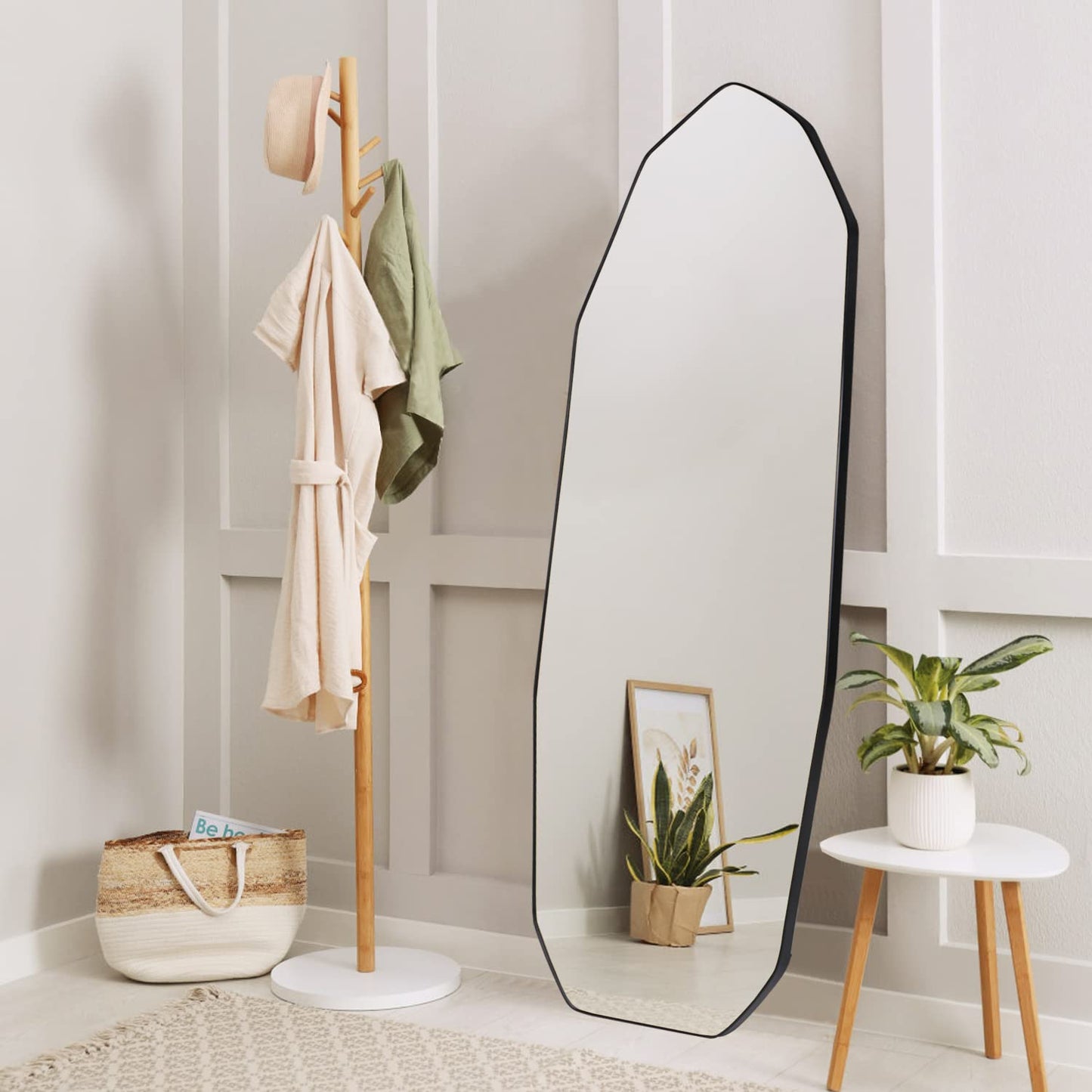 Irregular full-length mirror with sculptural frame, styled in a modern living space-2