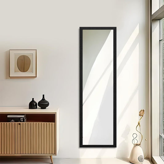 Minimalist full body mirror with slim frame, styled for wall or floor display in a modern interior