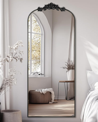 Arched freestanding full-length mirror with elegant frame, placed in a modern room setting-6