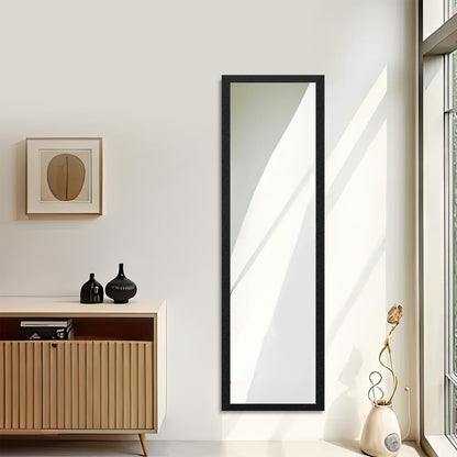 Minimalist full body mirror with slim frame, styled for wall or floor display in a modern interior